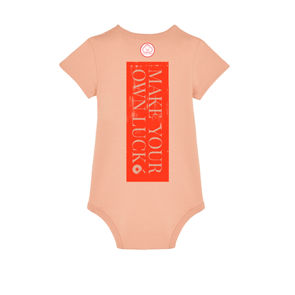 Reproducing the vibrant palette of the original artwork, this 210gsm Fresh Peach coloured 100% organic cotton baby bodysuit brings Niconico's lucky vibes into a beautiful wearable piece of art - a small Lucky Cat on the front and a full back Make Your Own Luck red envelope print on the back help you to bring a huge helping of good luck with you wherever your feet will carry you!
